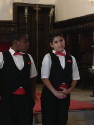 ... with a young boy's choir singing carols